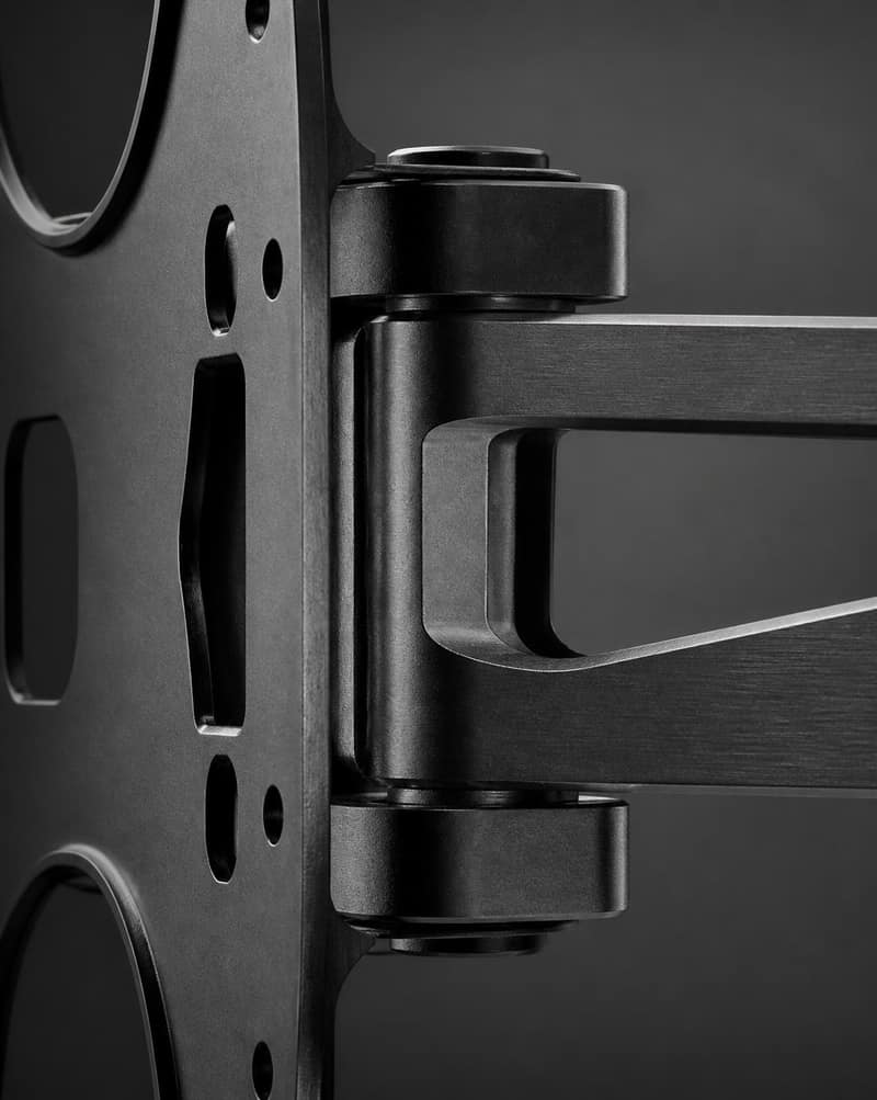 Macro detail of a matte black precision steel mount bracket